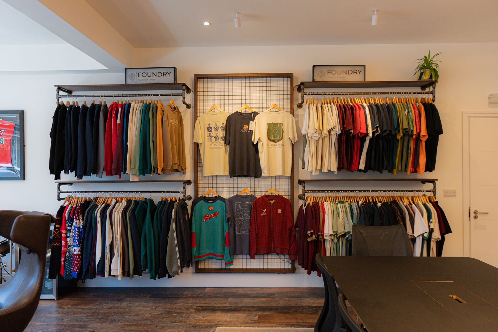 Showroom fit-out with bespoke apparel display rails